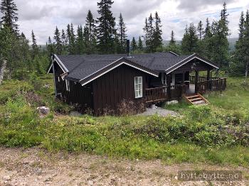 Klikk for stort bilde av 'Koselig laftet hytte i Trysil, like under tregrensen'